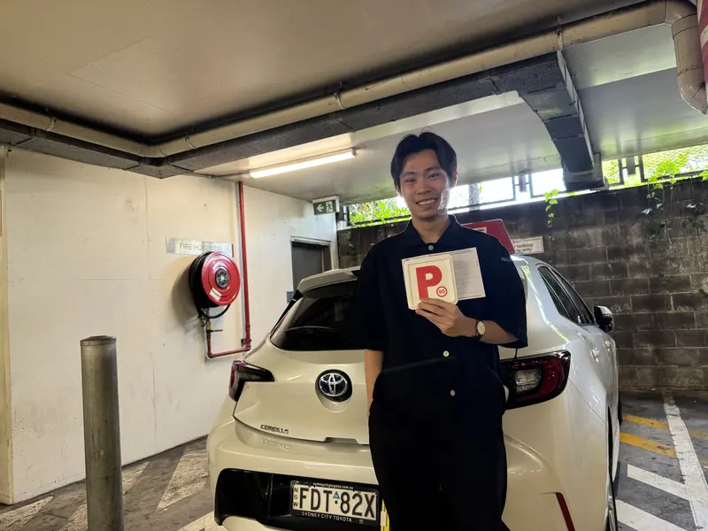 Learner driver practicing in Sydney with LThai Driving School
